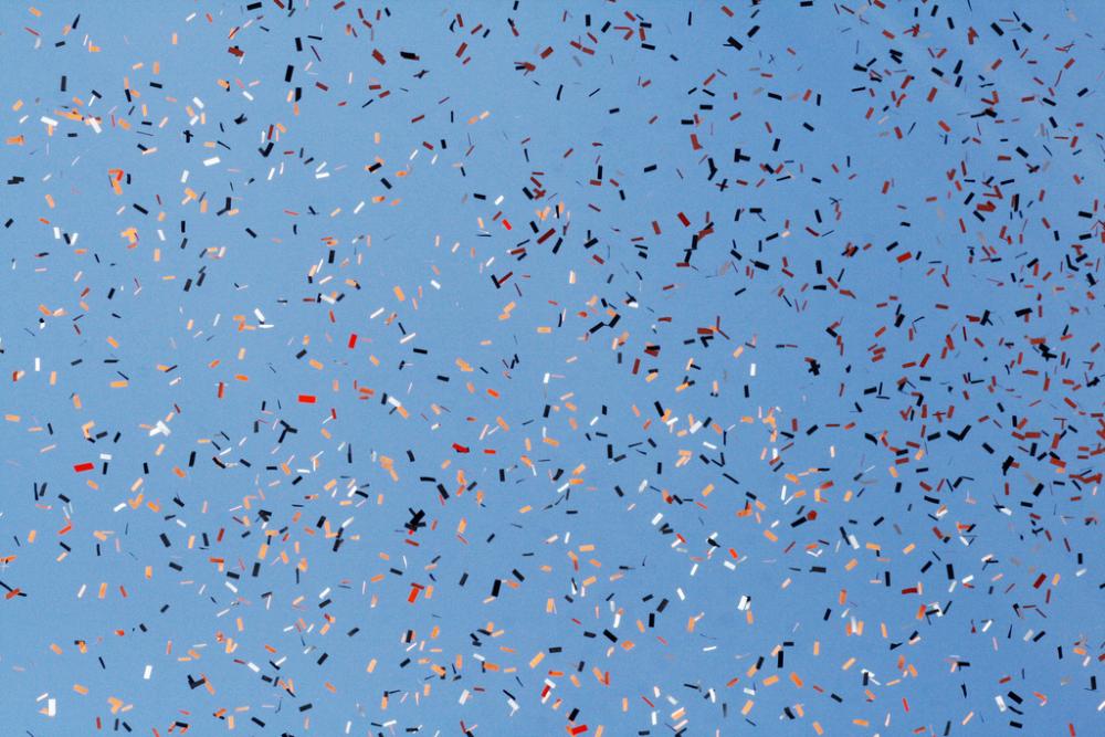 Sherrie Thai - Confetti Against a Blue Sky - CC BY 2.0